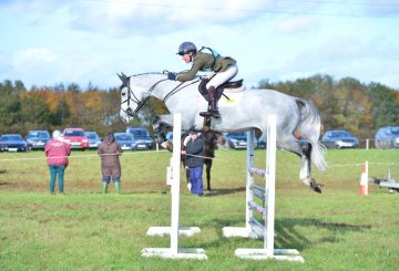 Eliza Stoddart and De Pleasure in the show jumping 360x245 - Eliza Stoddart Defends Five-Year-Old Championship at Oasby