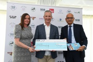 Ray Lee from Epsom RDA receives the Small Charity Award at SEIB Giving 2021 from Suzy Middleton SEIB CEO and Bipin Thaker SEIB COO 300x200 - SEIB Insurance Brokers to grant £50,000 to good causes in 2022